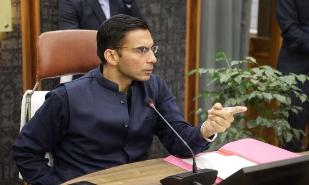Dehradun DM Savin Bansal reviewing action against illegal homestays and directing strict enforcement of regulations