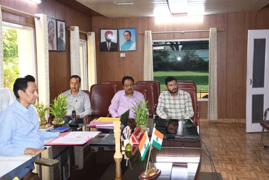 Principal Secretary reviewing drainage project with Kumaon Commissioner joining virtually