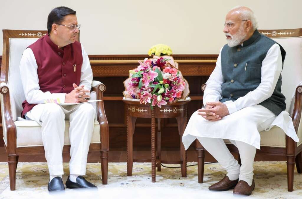 मुख्यमंत्री पुष्कर सिंह धामी और प्रधानमंत्री नरेंद्र मोदी की मुलाकात। (फाइल फोटो